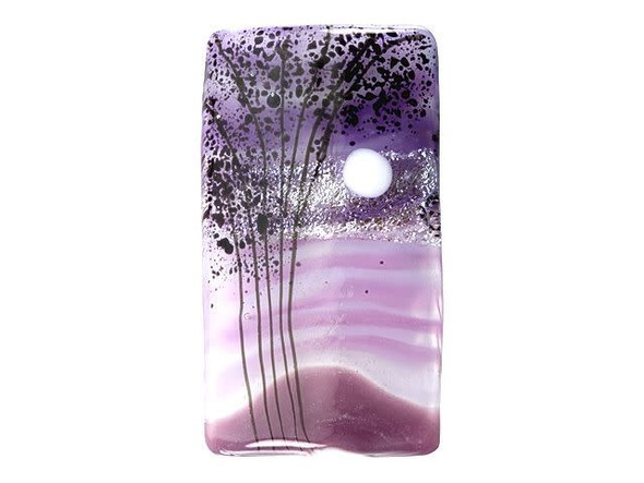 Get inspired by the beauty of a magical night with this Grace Lampwork bead. This bead features a rectangular shape and a puffed dimension that will stand out in your jewelry designs. Both sides are decorated with a scene of tall trees and a full moon on a swirling purple background. Silver glitter adds to the magic. Showcase this bead in a stringing project, dangle it from a head pin for a quick pendant, and more. It will make a bold statement anywhere. This item is handmade, so appearances may vary.