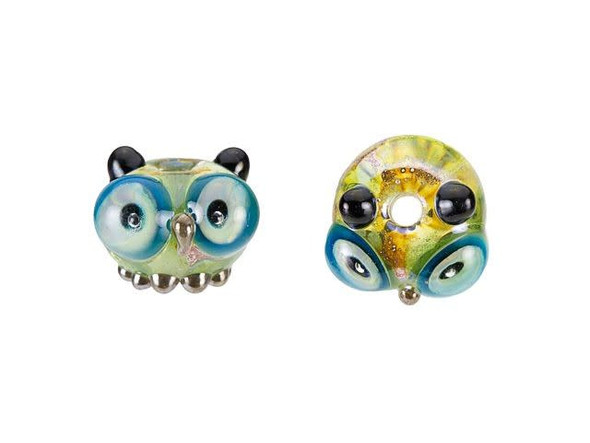 Make sure your designs are as cute as can be with this adorable owl bead. This rounded glass bead from Grace Lampwork takes on the shape of a tiny owl, complete with wide eyes, tufted ears, and little feet. You'll immediately fall in love with this little guy. String it onto a head pin for an instant pendant. The green body and blue eyes will work well with ocean colors.This item is handmade, so appearances may vary. Length 9-9.5mm, Width 15mm