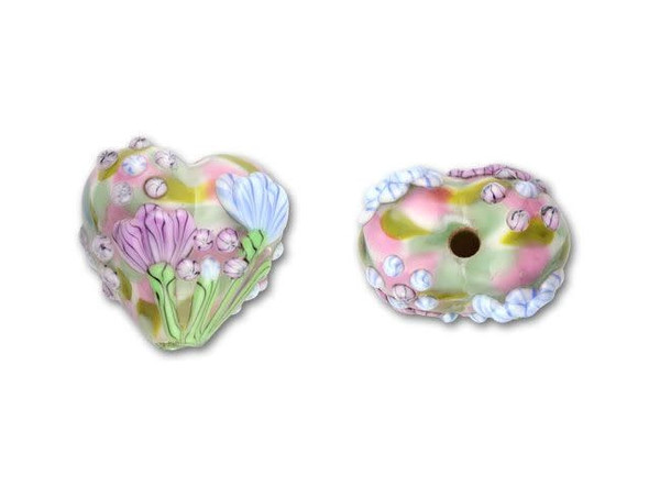 Swirls of pink, green, and white are wrapped in clear glass to create the background for this stunning large floral heart bead. The surface of the bead is detailed with a bouquet of pink and blue flowers. Use this exquisitely detailed bead as the focal point for a necklace. Because this lampwork bead is handmade by a glass artisan, each bead will vary slightly.This item is handmade, so appearances may vary. Length 18.5-19mm, Width 19.5mm