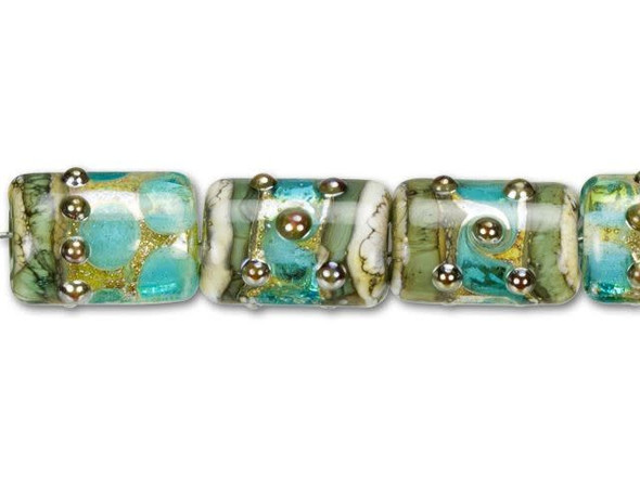Accent designs with the oceanic beauty of the Grace Lampwork cool teal ocean mini kalera bead strand. These rectangular beads feature a rounded, puffed dimension for a more elegant display. Their bold size will work in long necklace strands or as a focal piece in bracelet designs. Each bead is decorated with light blue circles, small raised dots in brown and accents of ivory and sea foam colors.This item is handmade, so appearances may vary.