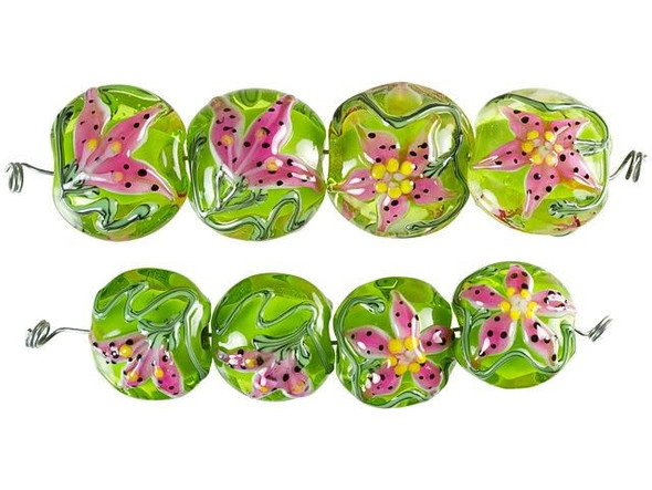 Unique style can be yours with the Grace Lampwork stargazer lily lentil beads. These beads are round in shape and feature a puffed dimension, so they are sure to stand out. Cheerful spring green color fills the glass, while both sides are decorated with a pink flower with black dots and swirling vines. These beads are versatile in size, so you can use them in matching jewelry sets.This item is handmade, so appearances may vary. Length 16-16.5mm, Width 18mm