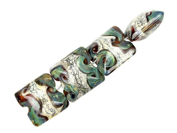 Hypnotic patterns fill these Grace Lampwork beads. These beads feature a square shape with a puffed dimension, so they will stand out in designs. Each bead features swirling patterns in rich green, brown, and ivory colors. They are perfect for earthy styles. The design is featured on the front and back of each bead, so they will look great from any angle. Use them in necklaces, bracelets, and earrings. This item is handmade, so appearances may vary.