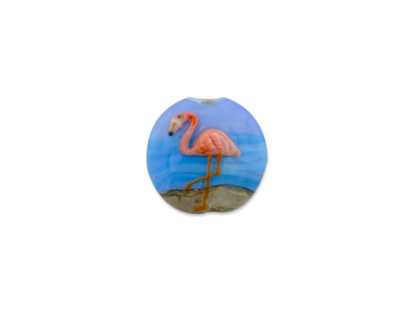 You&rsquo;ll love the look of this Grace Lampwork bead. This bead is circular in shape and features a domed dimension on the front that allows the design to stand out even more.  The front is decorated with a raised design of a pink flamingo in front of a brown and blue background. The back is flat and smooth so it will rest comfortably when worn. You can use this bead as a focal in bead embroidery or string it onto a head pin for a quick pendant. This item is handmade, so appearances may vary Dimensions: 25mm, Hole Size: 2.5mm