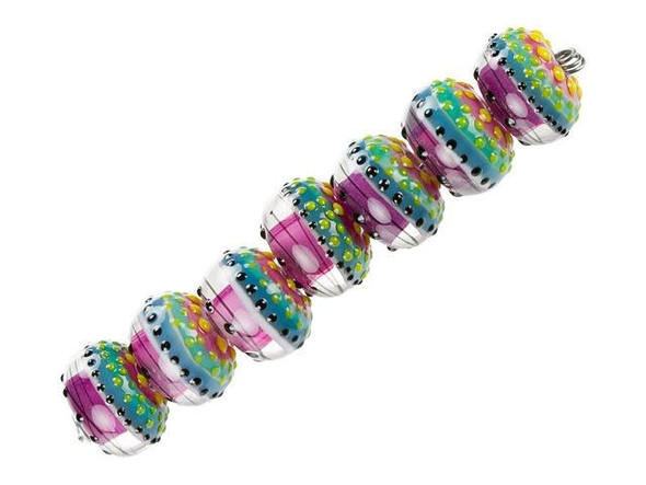 Keep your designs colorful with these Grace Lampwork beads. These beads feature a classic rounded shape and display stripes and dots in vibrant colors like aqua, hot pink, yellow, and black. They're sure to create a party in your style. Use them together in jewelry sets. They will stand out in necklaces and bracelets, alike. They feature wide stringing holes, so you can use them with thicker stringing materials, like silk ribbon. This item is handmade, so appearances may vary.