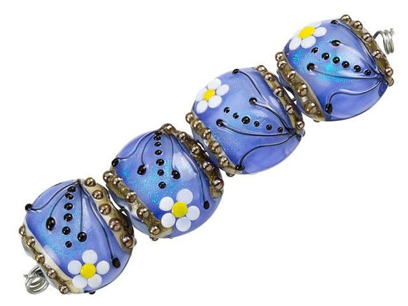 Transform your jewelry into a natural wonderland with the Grace Lampwork Arctic Blue Florals Lentil Bead Strand. These exquisite glass beads are delicately crafted into a circular lentil shape, with the appearance of a subtle puffed dimension. The surface is beautifully adorned with a white and yellow daisy with black swirls and dots, designed to capture the essence of nature. From every angle, these beads radiate a radiant powder blue color that shimmers with aqua glitter. Add these beads to your collection and create captivating pieces that showcase your creative spirit. Embrace the beauty of nature and elevate your craftsmanship to new heights.