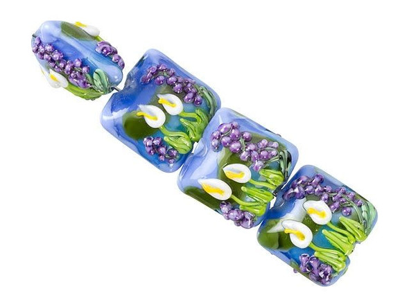 A cheerful spring display decorates these Grace Lampwork beads. These beads feature a square shape with a puffed dimension, so they will stand out in designs. Each bead features raised white calla lilies and purple flowers on a blue and green background. This design is featured on the front and back of each bead, so they will look great from any angle. Use them in necklaces, bracelets and earrings.This item is handmade, so appearances may vary. Length 14.5mm, Width 15-15.5mm