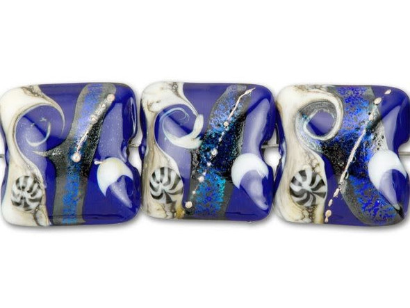 Take a moonlit path to your next inspiration from these Grace Lampwork beads. Each puffed rectangle bead is handmade from lampwork glass and displays a nighttime beach scene, complete with a deep blue sky that glitters like a blanket of stars. The creamy sand beach echoes with a wild crashing wave and a single nautilus shell, a tiny detail that rises off the surface of the bead. Use these beads as lovely focal points for a celestial necklace or bracelet idea paired with other rich blue and white components, or even add a touch of gold for a rich feel.This item is handmade, so appearances may vary. Length 14.5-15mm, Width 14.5-15.5mm