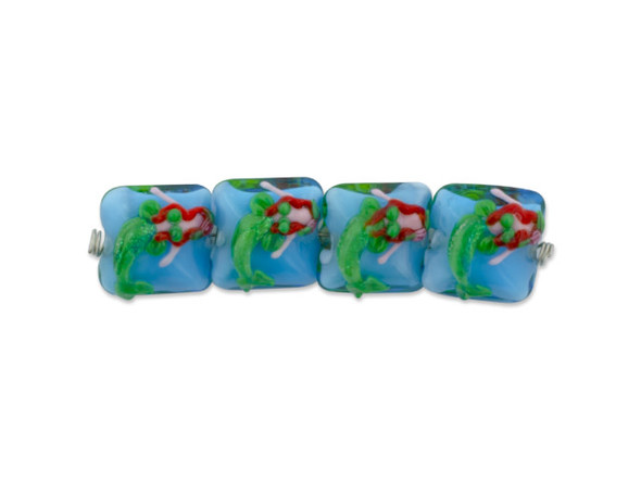 Bring the magic of the sea to your designs with these Grace Lampwork beads. These beads feature a square shape with a puffed dimension, so they will stand out in designs. The front of each bead features a raised design of a red-haired mermaid against a blue ocean background. The back side features red and orange fish swimming in front of green seaweed and a blue ocean background. Use them in necklaces, bracelets, and earrings. This item is handmade, so appearances may vary. Dimensions: 15 x 15mm, Hole Size: 2.5mm