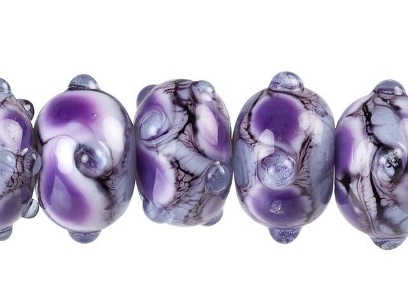 For fascinating style, try these Grace Lampwork beads. These glass beads feature mesmerizing patterns in lavender and periwinkle terms with hints of black and white swirls. Raised dots add texture. Use these outstanding beads in necklaces and bracelets for an unforgettable display. Use them with shining silver components for an eye-catching look.This item is handmade, so appearances may vary. Diameter 13.5-15.5mm, Length 9mm