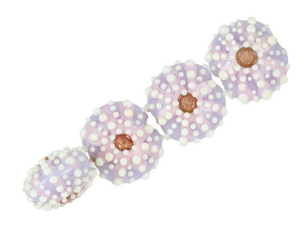 Decorate designs with ocean beauty using these Grace Lampwork beads. These beautiful beads feature a puffed round shape and display a textured sea urchin design. This design is featured on both sides of each bead, so they will look great from every angle. Use them as focal points in bold bracelet designs, add them to earrings, and more. You'll love the playful purple and pink colors.This item is handmade, so appearances may vary.