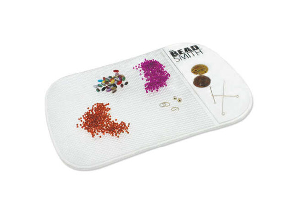 Are you tired of beads and small jewelry pieces rolling away while crafting? Do you want to avoid the frustration that comes with losing materials mid-project? Look no further than the Beadsmith Clear Sticky Bead Mat! With its unique sticky design, this mat keeps your components firmly in place without leaving any sticky residue. Its transparent design lets you view your materials against any background color and even doubles as a mini bead board for easy arrangement before stringing. Keep your workspace tidy and your projects perfect with the Beadsmith Clear Sticky Bead Mat.