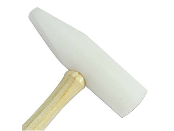 Revamp your jewelry-making with The Beadsmith Nylon Wedge Hammer! This durable white hammer is a game-changer for metal smithing and wire working. With its domed and wedge-shaped ends, this hammer gives you the flexibility and precision you need to shape sheet metal and wire in tight spots without causing any scratches or damage. Whether you're an expert or new to jewelry making, The Beadsmith Nylon Wedge Hammer is a must-have item in your toolkit. Unleash your creativity and take your jewelry-making skills to a whole new level with The Beadsmith Nylon Wedge Hammer!