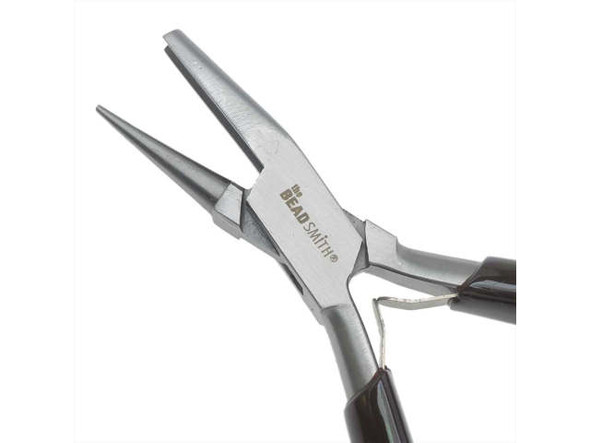 Attention beading artists! The Beadsmith Casual Comfort Wire Looping Pliers are the perfect addition to your toolkit. With a comfortable vinyl grip, these silver pliers make creating small rings, loops, and bends in wire a breeze. The concave and round nose design allows for perfect half-circle bends, making them ideal for all your beading projects. Don't let discomfort slow down your creativity - add these pliers to your collection today and experience the comfort and convenience of Casual Comfort.