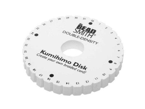 Beginner or expert, this Kumihimo Double Density Disk from Brand-The Beadsmith is the perfect tool for all your jewelry and cording needs. Its thicker and more robust design creates added tension, allowing for smooth braiding with Tex 135 S-Lon, #12 pearl Silk, or even smaller wire. You won't have to worry about slipping thanks to the 32 non-slip slots that line the edge of the disk, giving you complete control as you weave your unique creations. Measuring at 6 inches in diameter and 3/4" (20mm) thick foam, this disk is the ultimate crafting partner that comes complete with illustrated instructions and three project ideas. Invest in this white Kumihimo Double Density Disk and experience the joy of braiding with helby ease!