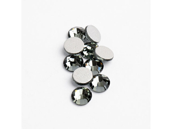 Bring a touch of glamour and sophistication to your jewelry and DIY projects with Crystal Lane Flat Back Rhinestones in Black Diamond. These mesmerizing crystals are perfect for adding a dash of bling to your jewelry, costumes, apparel, and home decor. With their shimmering foil-backed design, these crystals sparkle with brilliance, catching the light from every angle. Get ready to make a statement and turn heads with these stunning Black Diamond rhinestones from Crystal Lane. Sold in packs of 288 pieces, these affordable and glamorous rhinestones are sure to make your craft projects unforgettable.