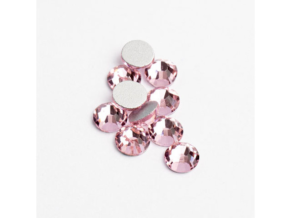 Upgrade your jewelry-making game with the Crystal Lane Flat Back Rhinestones in Light Pink. Let your creativity soar with these dazzling and budget-friendly rhinestones that are perfect for adding a glam touch to your DIY jewelry and crafting projects. The SS20 size and stunning Light Pink color will make your designs stand out, while the foil backing ensures that every rhinestone radiates brilliance. With 144 pieces per pack, you'll have plenty of opportunities to create sparkling and unique pieces that are sure to turn heads. Get ready to add a touch of glamour to your creations with these Crystal Lane Flat Back Rhinestones.