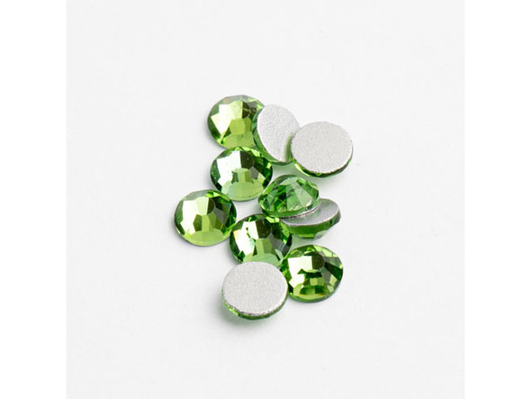 Add a touch of glam to your DIY projects with Crystal Lane's Flat Back Rhinestones in Peridot. These stunning crystals are perfect for adding sparkle to your handmade jewelry, costumes, and even home decor. The SS16 crystals are foil-backed for maximum brilliance and come in packs of 288 pieces. With Crystal Lane's affordable and dazzling rhinestones, you can easily take your creations to the next level. So why wait? Start bedazzling with Peridot rhinestones from Crystal Lane today!