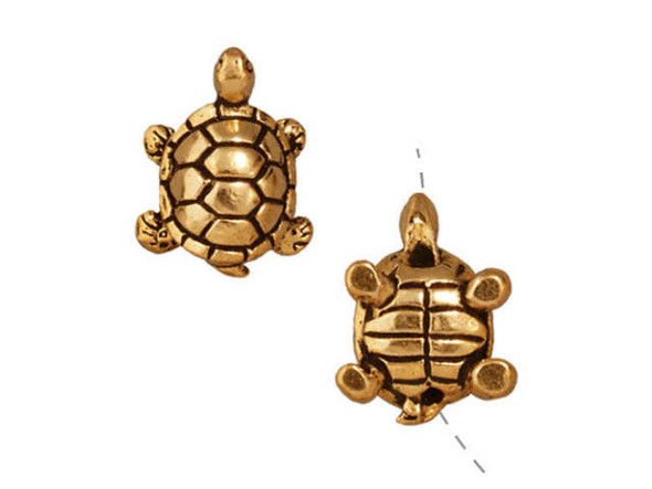 Capture the beauty of marine life in your jewelry designs with this stunning TierraCast Antique Gold Turtle Bead. This intricately designed, three-dimensional turtle bead is fully articulated and boasts highly detailed back and underside, making it perfect for any animal lover. This bead is plated with fine 22K gold in an antiqued finish, giving it a regal golden shine that is both classic and beautiful. Add this stunning gold-plated bead to your collection and create a cute accent in your designs that will make them stand out. Bring nature-inspired creativity to your DIY jewelry with TierraCast's Antique Gold Turtle Bead!
