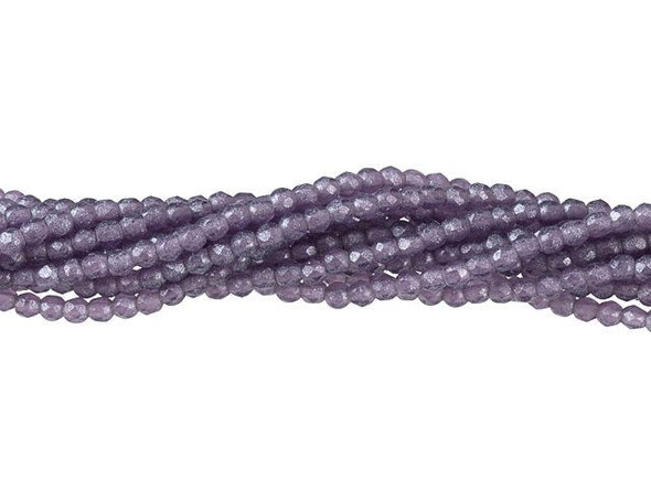Add a touch of rich regality to your jewelry designs with the Czech Glass 2mm Tanzanite Flash Pearl Fire-Polish Bead Strand by Starman. These exquisite beads boast a mesmerizing purple color, with a subtle sparkle that catches the light and captivates the eye. Crafted from high-quality Czech glass, each bead is perfectly round and adorned with diamond-shaped facets that create texture and dimension. Their tiny size makes them versatile for all kinds of designs, whether you're adding a pop of color to bead embroidery or using them as stunning spacers. Elevate your creativity with these enchanting beads from Starman.