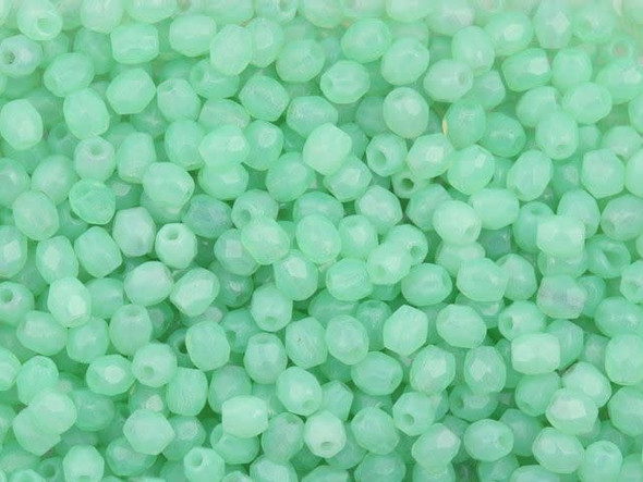 Add a touch of ethereal beauty to your jewelry creations with these 3mm Czech fire-polish beads in translucent green opal. Like tiny drops of dew on a summer morning, these dainty beads shimmer and sparkle with every ray of light. Whether you weave them into intricate patterns or use them as delicate spacers, these beads will bring a mesmerizing glow to your designs. Handmade with love, each strand includes approximately 50 radiant beads that are sure to ignite your creativity. With the exquisite craftsmanship of Brand-Starman and the enchanting allure of Czech glass, these beads are the perfect choice for any artisan looking to evoke a sense of nature's grace. Explore the endless possibilities and let your imagination flow with these captivating green opal beads.