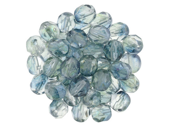 Add a touch of oceanic beauty to your jewelry creations with these Czech Fire-Polish Beads. Featuring a mesmerizing blend of blue and green, these transparent glass beads are perfect for capturing the essence of the sea. Their luster coating adds a touch of magic with hints of purple and a silvery sheen. Whether you're designing ocean-themed pieces or cool-toned masterpieces, these beads are sure to make a splash. Get creative and mix them with silver charms for a stunning bracelet or incorporate them into a pair of earrings. Handmade with love, each strand includes approximately 25 enchanting beads. Embrace the beauty of the ocean with these 6mm Fire-Polish Beads.