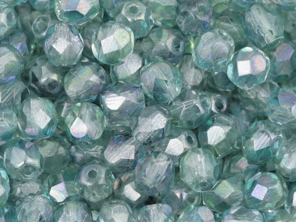 Add a touch of oceanic beauty to your jewelry creations with these Czech Fire-Polish Beads. Featuring a mesmerizing blend of blue and green, these transparent glass beads are perfect for capturing the essence of the sea. Their luster coating adds a touch of magic with hints of purple and a silvery sheen. Whether you're designing ocean-themed pieces or cool-toned masterpieces, these beads are sure to make a splash. Get creative and mix them with silver charms for a stunning bracelet or incorporate them into a pair of earrings. Handmade with love, each strand includes approximately 25 enchanting beads. Embrace the beauty of the ocean with these 6mm Fire-Polish Beads.