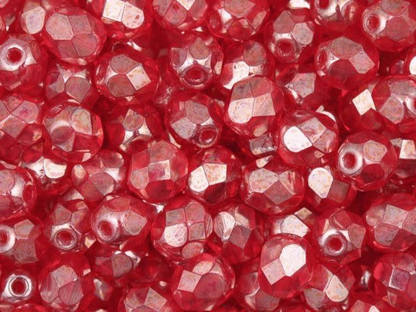 Make a statement with these stunning Czech Fire-Polish Beads in Ruby Luster. These transparent beads feature a captivating red hue, enhanced by a mesmerizing silvery luster that adds an irresistible shine. Their unique faceted design sets them apart from other glass beads, making them a perfect choice for adding a touch of elegance to your handmade jewelry or DIY crafts. Whether you're creating necklaces, bracelets, or earrings, these versatile 6mm beads will bring your designs to life. Embrace their beauty and let your creativity shine. Please note that as each bead is handmade, appearances may vary. Each strand includes approximately 25 beads.