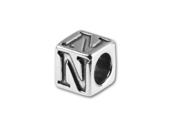 This quality sterling silver alphabet bead features the letter N engraved into four sides. Made in the USA, this 4.5mm alphabet bead features a wonderful cube shape that will stand out in your designs. You can use the wide stringing hole with thicker stringing materials, too. 