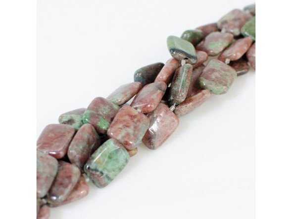 Kashgar garnets, named after an ancient crossroads city in the far west of China's Xinjiang province, are a colorful mix of opaque red and green.Please see the Related Products links below for similar items, and more information about this stone.