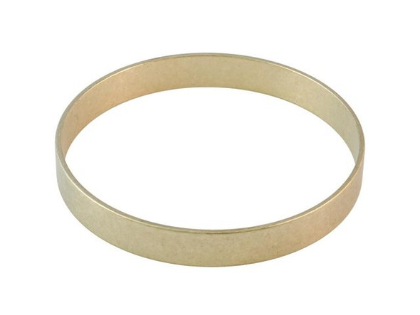   Raw brass is unplated, and is not as shiny as most plated finishes.    To remove tarnish, use brass cleaner, a polishing cloth, or fine grit (1000 - 1500) sandpaper.To give a high polish to raw brass items, tumble-polish them with steel shot, water and a burnishing compound in a rock tumbler.To create an antiqued look on raw brass, apply an oxidizing solution.   See Related Products links (below) for similar items and additional jewelry-making supplies that are often used with this item.