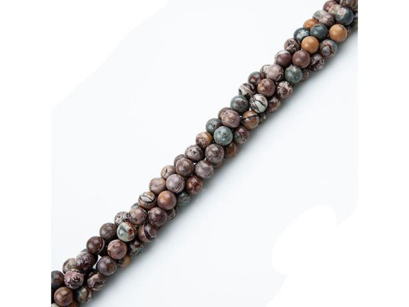 Our Sonora Jasper beads have striking desert-landscape patterns in subtle desert colors of red, brown, tan, cream and gray-blue. The tracks and circles on these beads are reminiscent of the famed "canals" on Mars, as well as dentritic sun-dried waterways on Earth. Our beads are not as vivid in hue as classic Sonora Sunrise or Sonora Sunset, but what they lack in hue, they make up for in dramatic patterns. Jaspers stones are believed to carry a strong connection to the Earth's energy, making jasper a helpful stone for grounding, stability and strength.Find related items below, and find out more about jasper in our Gemstone Index.