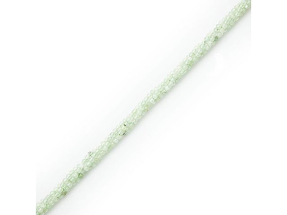 Prehnite beads are also known as cape emerald beads and look extremely similar to green tourmalated quartz beads. Usually ranging from pale to grass green, prehnite can also be gray, white, black, brown or colorless. These semiprecious beads are hard, durable gemstones consisting of a hydrous silicate of alumina and lime. Their bright, almost luminescent coloring frequently features inclusions of black amphabole, which make them easy to confuse with green tourmalated quartz. Prehnite's luster is vitreous to waxy, and its crystals are transparent to mostly translucent. This gemstone is often found with zeolites, but the two stones are from different geologic classes. Other minerals confused with prehnite include gyrolite, smithsonite, and hemimorphite. Known as the "prediction stone", prehnite is believed to enhance dreaming and remembrance. Crystal healers use it to reduce high blood pressure and control hypertension. Please see the Related Products links below for similar items, and more information about this stone.