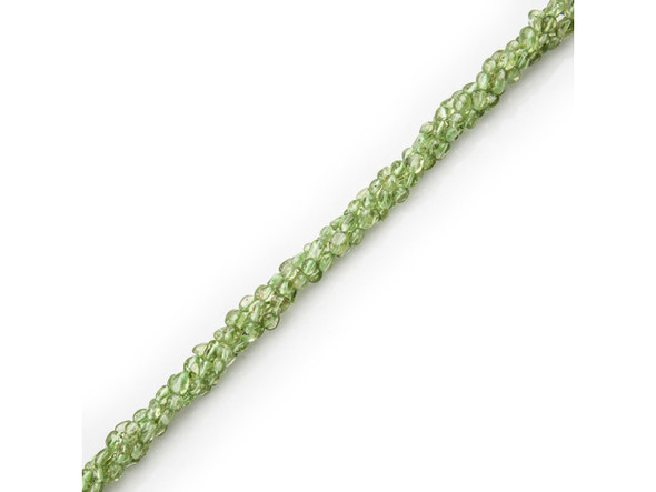 Peridot beads are known by many names, including bastard emerald, chrysolite, evening emerald, hawaiite, night emerald, and peridote. These pretty green semiprecious beads are cut from an olivine variety composed of magnesium iron silicate. Peridot splits and bends the rays of light passing through it, giving it a velvety appearance and rich glow. Pronounced PEAR-ih-doh (or PEAR-ih-dot), its yellow-green color is mainly dependent on the amount of ferrous iron present. The traditional birthstone of August, peridot has been mined for over 4,000 years, and is mentioned in the Bible under the Hebrew name pitdah. It is said to have been Cleopatra's favorite gemstone. Avoid exposing peridot beads to acids, quick temperature changes, scratches, sharp blows, or home ultrasonic cleaners.Peridot is purported to help slow aging and help speech. Many believe it to increase patience, confidence, and assertiveness. Please see the Related Products links below for similar items, and more information about this stone.