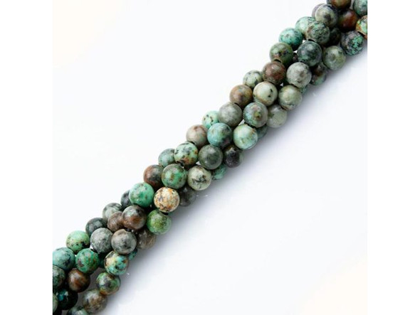 African Turquoise BeadsAfrican turquoise is a descriptive name and is not true turquoise, but actually a jasper found in Africa. These semiprecious beads have a matrix structure similar to that of turquoise, and are light bluish-green in color. Jasper is a harder stone than turquoise, so these beads are more durable than true turquoise.   The matrix in African turquoise is usually dark or black, and African turquoise beads do provide a good substitute for genuine turquoise beads. As with many semiprecious gemstones, identifying a stone accurately can be tricky!African turquoise looks very similar to variquoise, a unique combination of variscite and turquoise found in Utah and NevadaPlease see the Related Products links below for similar items, and more information about this stone.