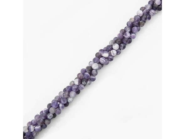 Cape Amethyst beads are cut from amethyst that is layered or striped with milky quartz that forms attractive patterns in the stone. This semiprecious gemstone is usually translucent and ranges in color from light purple to medium purple. Our cape amethyst beads are created by Mother Nature, so keep in mind that the bead strands you buy will not have identical patterns to the strand pictured in our secure online store. Amethyst is said to instill high ideals and urge one to do what is right. These semiprecious beads are also said to cure impatience, balance high energy, eliminate chaos, and help keep one grounded. To help your cape amethyst gemstone beads maintain their full purple hues, do not store them in direct sunlight. Please see the Related Products links below for similar items, and more information about this stone.