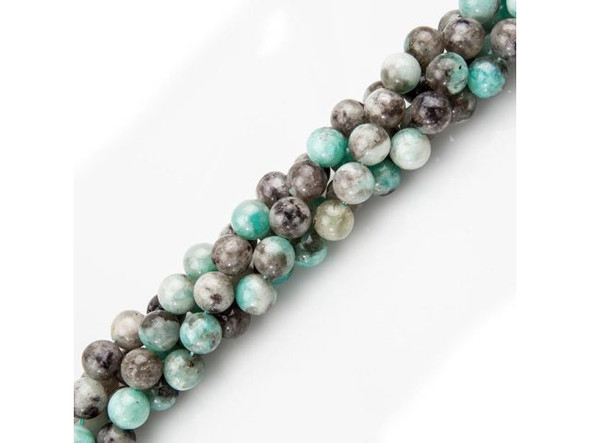 Natural rainbow amazonite beads offer a wider color range than our other semiprecious amazonite beads, displaying not just shades of pale sea-mist blue-green, but also gray, brown, yellow, and rust. Some of these semiprecious gemstone beads contain visible bits of sparkly pyrite, providing even more visual interest. Amazonite is believed to improve one's skin health, marriage, clarity of thought, and social interaction. Rainbow amazonite is also credited with alleviating muscle spasms, stress, and exhaustion.If you choose to wash your rainbow amazonite beads, be sure to use lukewarm soapy water and do not use steamers, abrasives, or chemicals. Please see the Related Products links below for similar items, and more information about this stone.