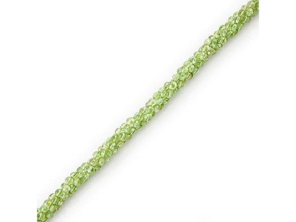 Peridot beads are known by many names, including bastard emerald, chrysolite, evening emerald, hawaiite, night emerald, and peridote. These pretty green semiprecious beads are cut from an olivine variety composed of magnesium iron silicate. Peridot splits and bends the rays of light passing through it, giving it a velvety appearance and rich glow. Pronounced PEAR-ih-doh (or PEAR-ih-dot), its yellow-green color is mainly dependent on the amount of ferrous iron present. The traditional birthstone of August, peridot has been mined for over 4,000 years, and is mentioned in the Bible under the Hebrew name pitdah. It is said to have been Cleopatra's favorite gemstone. Avoid exposing peridot beads to acids, quick temperature changes, scratches, sharp blows, or home ultrasonic cleaners.Peridot is purported to help slow aging and help speech. Many believe it to increase patience, confidence, and assertiveness. Please see the Related Products links below for similar items, and more information about this stone.