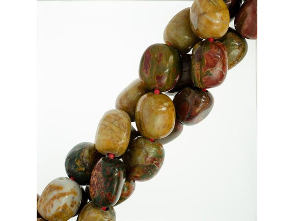 Red creek jasper beads are also known as Chinese picasso beads, reed picasso beads, and red cherry creek jasper beads. While these stunning semiprecious beads offer wonderful patterns in shades of rusty red, ochre, taupe and gray, the name is descriptive. Red creek jasper isn't an actual jasper, but a softer gemstone which should be treated with care. Mineralogical testing has not yet determined the chemical makeup of these gemstone beads. Nevertheless, their unique mix of warm and cool tones pairs well with both copper and silver, making these beads very versatile. Red creek jasper is said to be named after a stream that runs through the area of China where the gemstone was discovered.  Find related items below, and find out more about jasper in our Gemstone Index.
