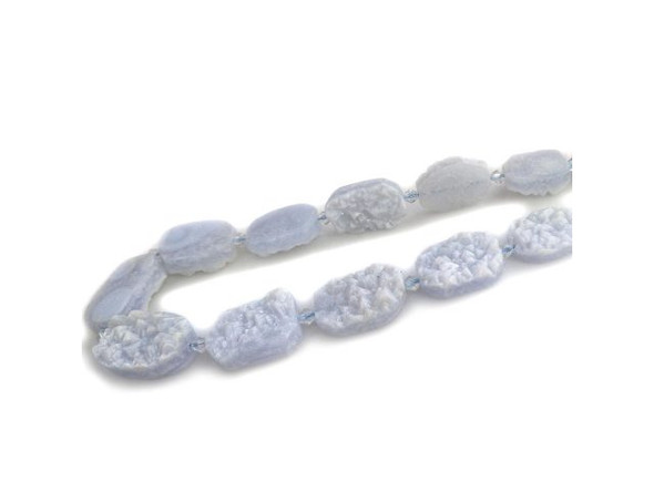 Blue Lace Agate gemstone beads add a soothing baby blue hue to the gemstone palette, displaying subtle light blue bands in lacy and wavy patterns. Just keep in mind that gemstones are made by Mother Nature, and each gemstone bead will be unique. This pastel blue gemstone is said to lighten situations and nurture maternal impulses. In traditional Eastern practice, blue lace agate is linked to the throat chakra, and is worn to help calm overactive thyroid and parathyroid glands, as well as assist in clear and confident communication.  Please see the Related Products links below for similar items, and more information about this stone.