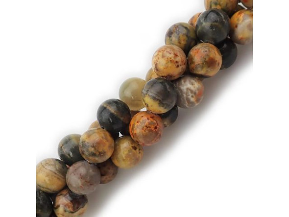 Bumblebee Jasper is a warm mixture of yellows and grays, with some white and orange. Many of the beads on each strand are striped, and some are spotted, giving the effect of a fuzzy bumblebee with patches of pollen, weaving through the air from flower to flower. Jasper is a semiprecious chalcedony (or microcrystalline quartz). It derives its colorful patterns from other minerals present, and is often named according to its pattern. The Greek origin of the word jasper, iaspis, means "spotted stone." Jasper has a dull luster but takes a fine polish, and its hardness and other physical properties are those of quartz. Due to its earthy colors and microcrystalline quartz structure, Jasper is considered to be a nurturing stone. Gray jaspers are believed to bring serenity and unity, as well as filter distractions and increase motivation. If using jasper beads for chakras, choose a jasper that contains colors relevant to the chakras that are the target of your focus -- in this case, shades of yellow for the navel (solar plexus) chakra, for issues with self-esteem and personal power.With each purchase of bumblebee jasper, you're also helping power up the Pollinator Partnership!  Find related items below, and find out more about jasper in our Gemstone Index.