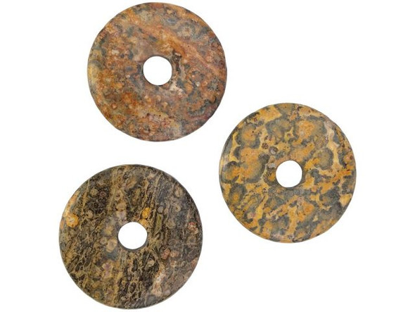 Leopardskin Jasper beads are descriptively named, and are actually cut from a type of rhyolite, composed in part of feldspar minerals. These semiprecious beads are mottled with red, yellow, brown, and pinkish spots like the fur of a leopard. It is considered a wonderful gemstone for bringing wanted things into your life. It also may enhance your total vibration, stabilizing the heart and solar plexus areas. In general, rhyolite gemstones are said to represent change, variety, and progress. They are said to light the fire of creativity, help with self-realization, balance emotions, increase self-respect, and enhance the capacity to love.  Find related items below, and find out more about jasper in our Gemstone Index.