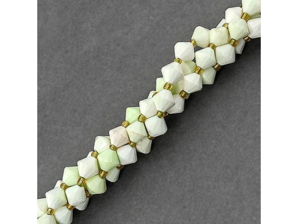 Lemon chrysoprase beads are also known as citron beads and lemon magnesite beads. These semiprecious gems offer a lighter yellow-green hue than true chrysoprase, and are actually a form of magnesite with brown to light-tan veining. The distinction between chrysoprase (a valuable, opalescent green chalcedony quartz) and lemon chrysoprase might simply be the amount of the underlying mineral (quartz vs. magnesite).Please see the Related Products links below for similar items, and more information about this stone.
