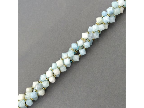 Aquamarine belongs to the beryl gemstone family. Bead-grade aquamarine tends to have many interesting inclusions and numerous opaque areas. Beryls are hard gemstones, excellent for jewelry that will be worn frequently. However, be sure to store aquamarine beads in a dark place, as they often become paler if left out in the sun. Its name is derived from the Latin words for "water" and "sea." Aquamarine is said to protect from perils of the sea, including seasickness, and to heal issues related to the throat chakra, such as nerve pain, toothaches and disorders of the neck, jaw and throat.Please see the Related Products links below for similar items, and more information about this stone.