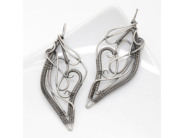 You will make Ethereal wire woven earrings in this class. This is an intermediate wire weaving class. Must know the modified soumak weave before coming to class.Classes start on time; plan to arrive 15 minutes early with the following:We have two options for this class...Option 1-Kit fee of $35 for Sterling Silver Wire or $15 for Copper Wire in cash payable to the instructor the day of class.Come prepared with ALL other tools listed below in the material/tools list.Kit includes:  Wire and dowelOption 2-Come prepared with ALL materials and tools listed below in the materials/tools list.Classes start on time; plan to arrive 15 minutes early with the following: Materials: (Choose one group of wire below if you are not going with option #1) Group 1:#64-820-18 9" Argentium Silver Wire 18ga#64-820-20 35" Argentium Silver Wire 20ga#64-899-28 20' Fine Silver Wire 28gaGroup 2:#64-526 9" Sterling Silver Wire 18ga#64-527 35" Sterling Silver Wire 20ga#64-899-28 20' Fine Silver Wire 28ga Group 3:#47-405-18 9" Bare Copper Wire 18ga#47-405-20 35" Bare Copper Wire 20ga  #47-405-28 20' Bare Copper Wire 28ga  Tools:#69-275-53 Chain Nose Plier#69-275-52 Round Nose Plier#69-275-58 Flat Nose Plier#69-271-91 Nylon Jaw Plier#69-380 Cutter#69-142 Files#65-801 Awl#63-130-01 Bobbins8mm dowel (available at any craft or hardware store)Fabric bandage tapeRulerPermanent Marker#63-528 Polishing Pads (optional)