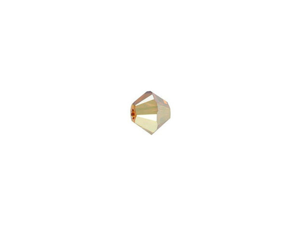 Metallic shine comes alive in the PRESTIGE Crystal Components 5328 4mm Bicone in Crystal Metallic Sunshine 2X. This bead features the popular Bicone shape that tapers at both ends, much like a diamond. The multiple facets cut into the surface of the crystal create a sparkling effect that is sure to catch the eye. This versatile bead can be used in necklaces, bracelets and earrings alike. Use this small bead as a spacer or a pop of color in earrings. It features an amazing golden color that has been applied two times to cover the whole bead. This effect is not plating resistant.Sold in increments of 24