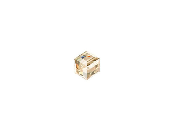 You'll love creating unforgettable style with this PRESTIGE Crystal Components cube bead. This modern bead features a cube shape with precision-cut facets for sparkle from every angle. This bead is perfect for creating a playful feel in your designs. Try it in necklaces, bracelets and even earrings. It's sure to add excitement to your style. This small bead features a champagne gold color.Sold in increments of 6