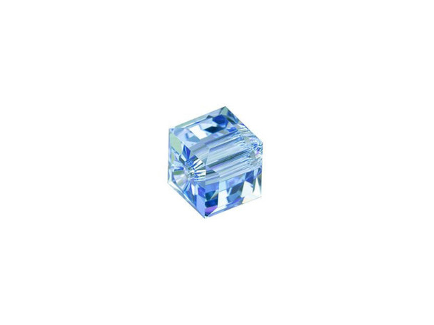 Bring geometric flair to your projects with this PRESTIGE Crystal Components cube bead. This modern bead features a cube shape with precision-cut facets for sparkle from every angle. This bead is perfect for creating a playful feel in your designs. Try it in necklaces, bracelets and even earrings. It's sure to add excitement to your style. This bead is versatile in size, so you can use it in necklaces, bracelets, and earrings. The shimmer effect is a special coating specifically designed to capture movement. This effect adds brilliance, color vibrancy, and unique light refraction. This chaton features a soft blue color with the shimmer effect bringing subtle iridescent pink and purple tones.The Shimmer B coating is only applied to three sides of the cube bead.Sold in increments of 6