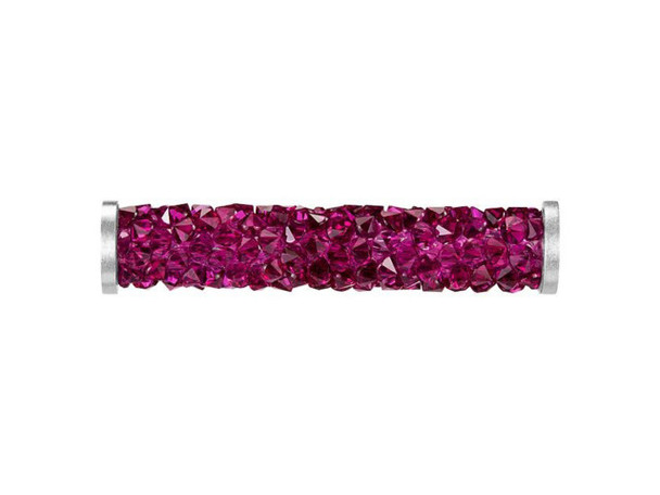 Dazzling glitter fills this PRESTIGE Crystal Components bead. This Fine Rocks tube bead can be used easily on leather to create stunning jewelry or you can sew it into projects for beautiful textile applications. This bead allows you to bring a glittering pave look to designs. The surface is covered in double-pointed size PP14 chatons. This long tube bead features stainless steel end caps for a polished and professional finishing touch.
