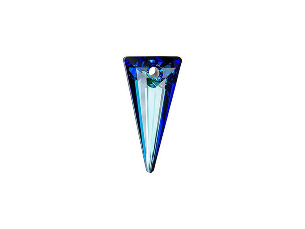 Your designs will pop with color when you use the PRESTIGE Crystal Components 6480 28mm spike pendant in Crystal Bermuda Blue with protective coating. This pendant features a geometric triangular shape can be used in anything from classy jewelry sets to spiky glam rock pieces. You can pair it with leather, chain, pearls and more. It's sure to dress up any look with cool sparkle. This pendant is large in size, so it will make a beautiful focal in your designs. This pendant displays vibrant shades of blue that sparkle from every angle.