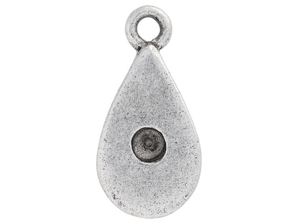 Accent your designs with this Nunn Design tiny bezel teardrop charm.  This charm features a teardrop shape and has a plain finish on both sides. On the front side in the center of the charm is a bezel for placing a stone. This bezel is designed to fit 24pp sized chatons and would work great with PRESTIGE Crystal Components PP24 Chatons. This charm has an antique silver color.